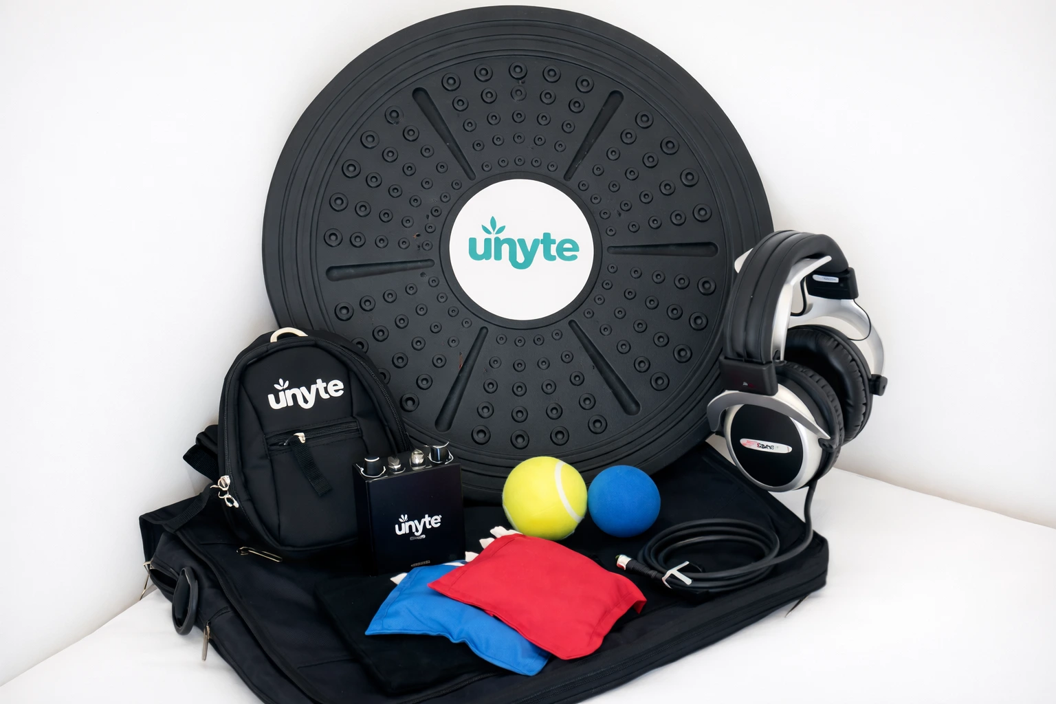ILS Integration Kit: balansbord, boneconduction-koptelefoon, versterker, pittenzakjes en ballen van Unyte
